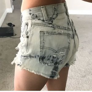 Tie dye distressed wedgie fit Levi’s shorts